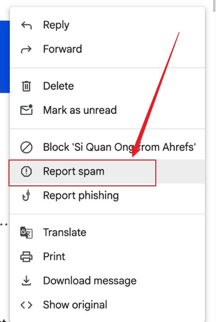 Select the Report spam option in Gmail