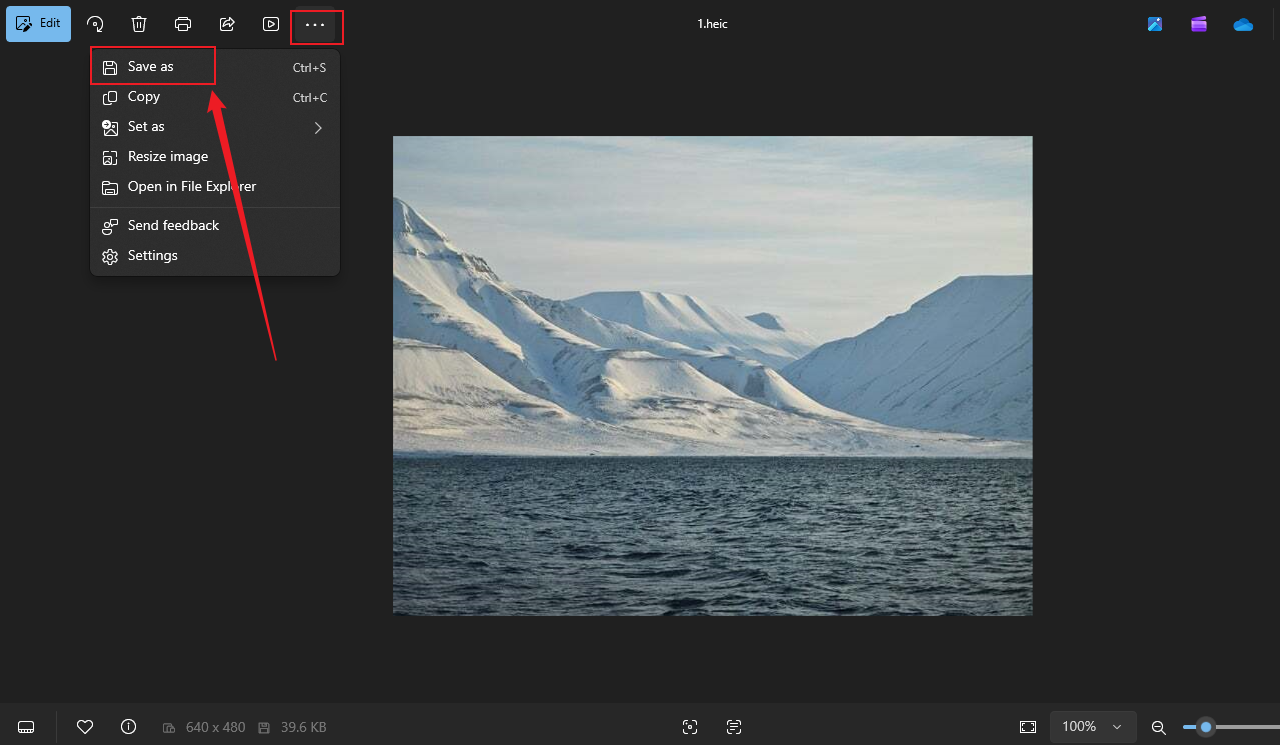Click the three-dot icon and click Save as in the Photos app